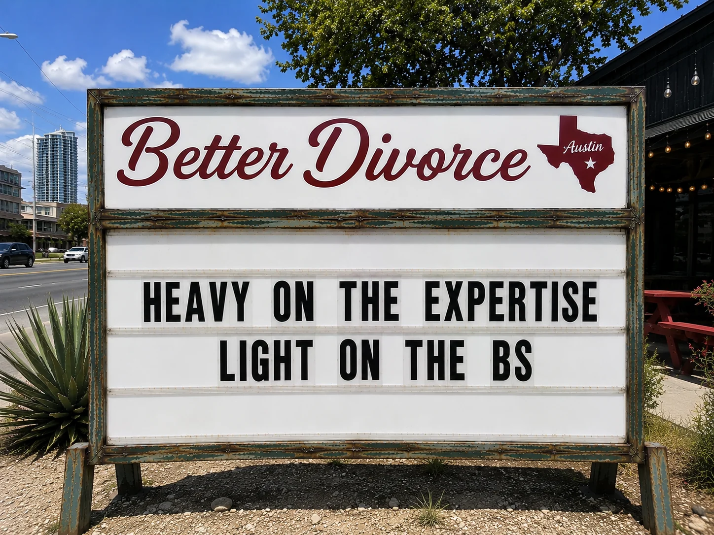 A letter-board sign for Better Divorce Austin.